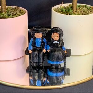 John Wright Cast Iron Amish Man & Woman on Bench 3 piece Figurine set
